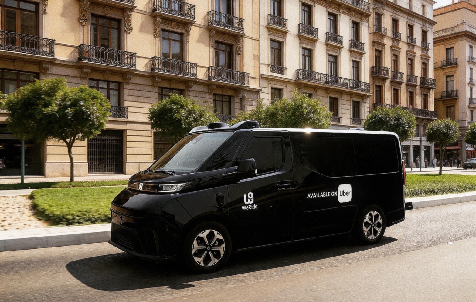 A black WeRide GXR robotaxi with Uber branding on a Madrid street.